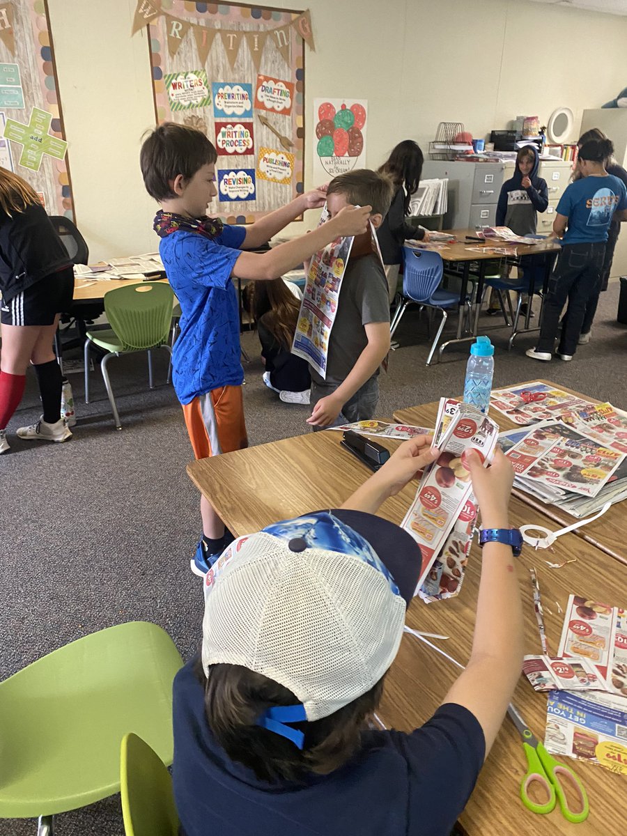 KelleeYoder's tweet photo. Our first day of 6th grade orientation today, “Shark Week” was a blast today! We had a newspaper fashion show in my room. Teamwork, creativity &amp; design from day 1! https://t.co/MSzFA1d5Wf
