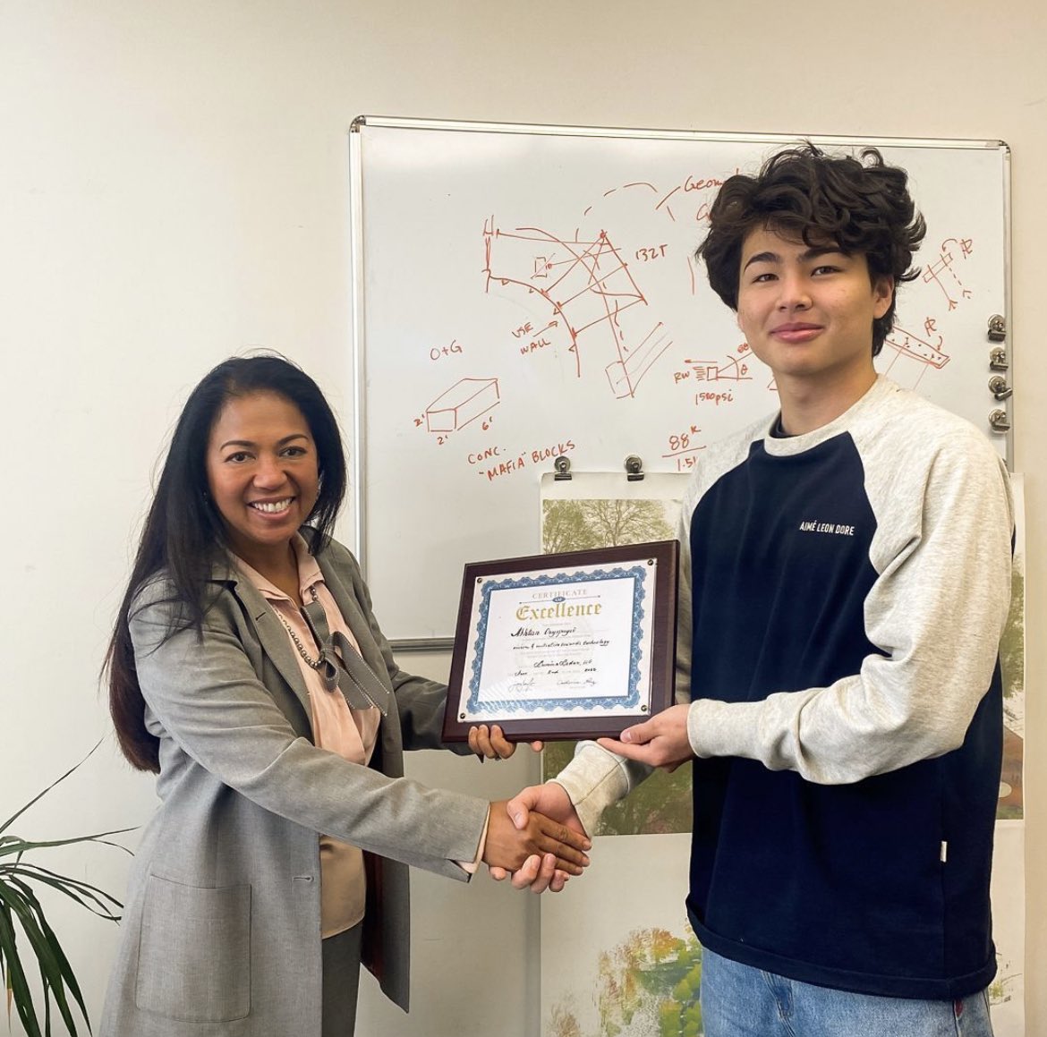 We are proud to honor one of our latest interns with the "Plaque of Excellence" from the CEO herself. Akhtan is a local high-school senior headed to Fairfield University in the fall to continue his education. He was a key player in developing Lumina Lidar's new drone pay-load!