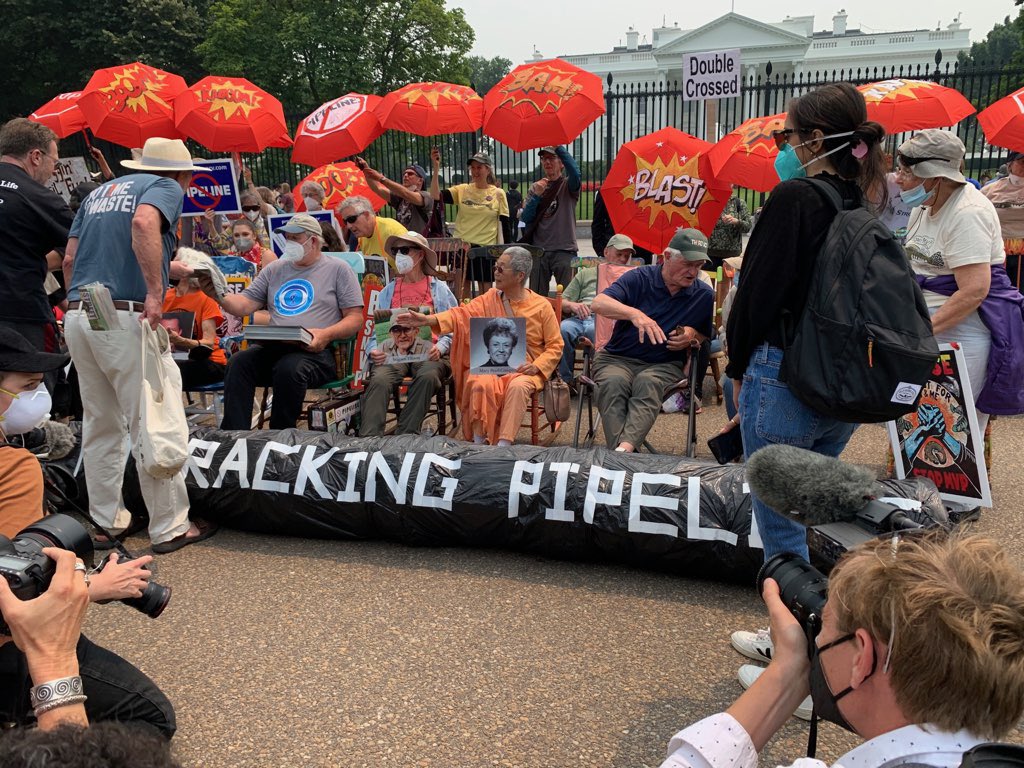 SierraGFG's tweet photo. @billmckibben @ThirdActOrg @POWHR_Coalition The rocking chair brigade and their “No Frackin’ Pipeline” at their feet! Powerful message to administration to #StopMVP https://t.co/E3NAbLC4yC