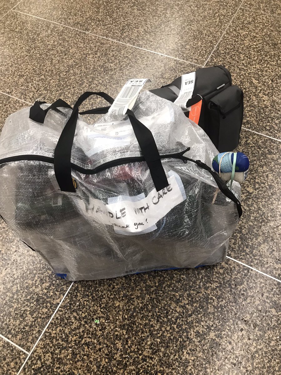 kayruun's tweet photo. @claw789 @schneider I’ve done it twice. So far so good. Used the Dimpa bag and checked it. First pic shows the seat post poking out of misaligned zipper when it arrived at baggage claim in Seattle, but the bike was fine. https://t.co/77R81y4MYb