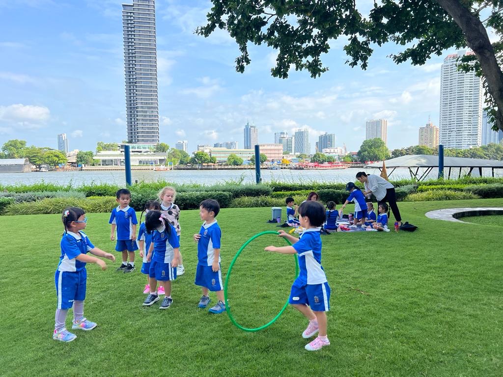 EY1 picnic and games by the river here in BKK