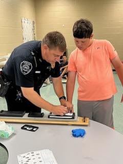 Students in our “Top Investigator”Career Class  were lucky enough to learn about the process of fingerprinting from our very own Mr. Vandiver. <a href="/KnightsR7/">Farmington Knights</a>