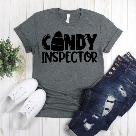 GThenewblack's tweet photo. Halloween TShirt - Candy Inspector Uppercase https://t.co/y5sSfNjsNi #disneyshirt #halloweenshirt #personalizedshirt #drinkingshirt @etsymktgtool https://t.co/yNKqB92qSe