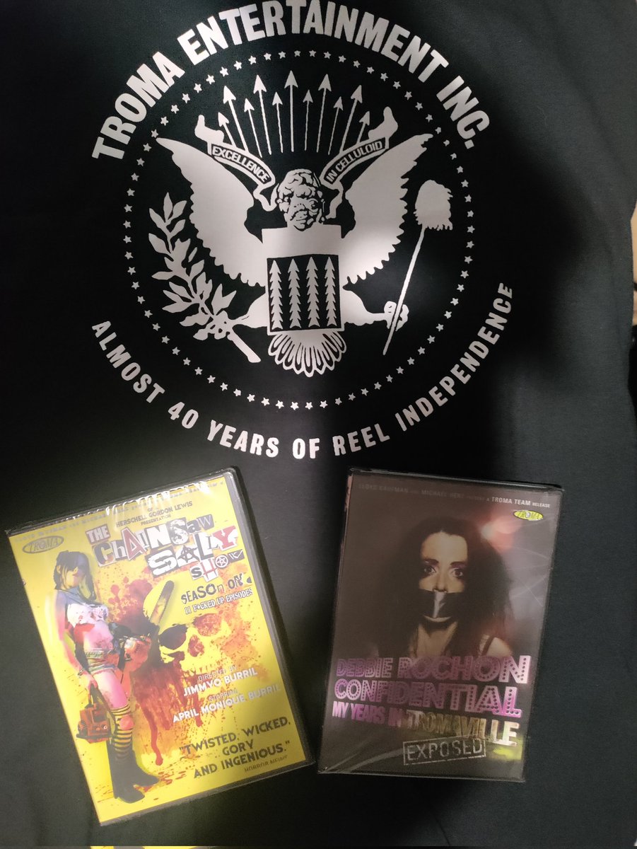Look what I got from @Troma_Team today!

Always luved watching @Chainsaw_Sally and one I've never seen @DebbieRochon  Docu. Of course one of my Fav is #TromeoAndJuliet 

Thank You Uncle @lloydkaufman  gonna wear the shirt tomorrow at @SpookalaFL