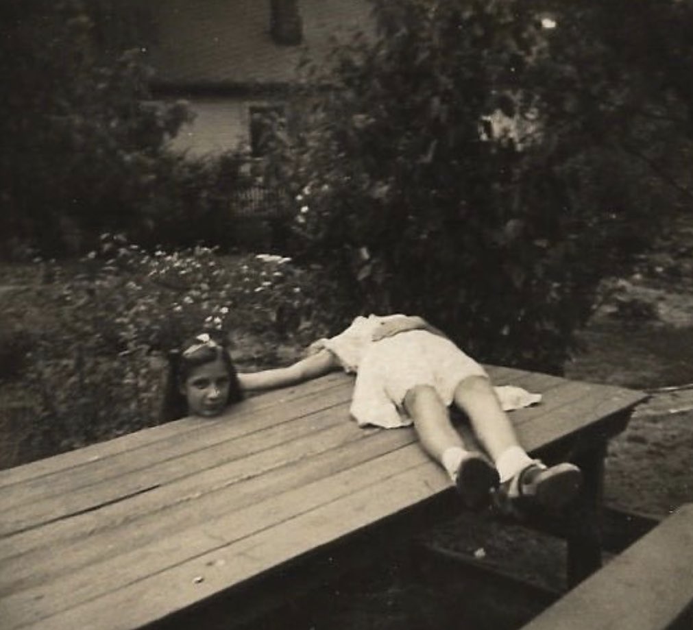 To appear headless while taking a photo, known as 'horsemaning', was a popular way to pose in the 1920's.

Horsemaning, also known as 'headless posing,' is a photographic technique where the subject creates the illusion of being beheaded, with their head placed on the ground or