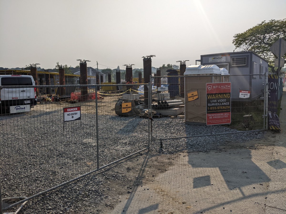 Island-eye view of <a href="/VineyardWindUS/">Vineyard Wind</a> construction projects. New marine terminal, next to local oil+gasoline distributor. Workforce housing (I think?) under construction across the street, looks like it will be resilient to sea-level rise, ha