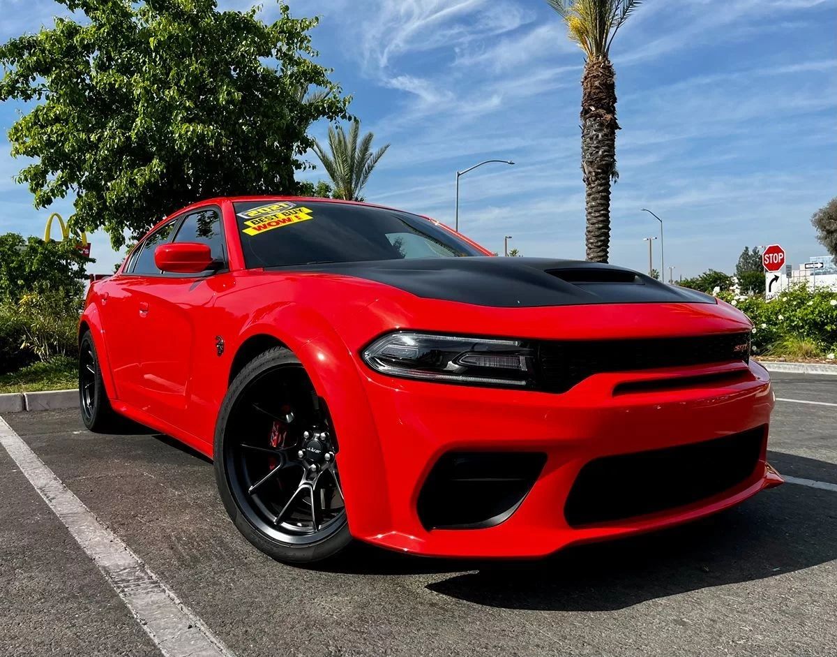 OwnACarCA's tweet photo. Amazingly quick and powerful, our 2021 Dodge Charger SRT Hellcat Redeye Widebody Sedan in Go Mango is only for the most extreme enthusiasts! Motivated by a SuperCharged 6.2 Liter HEMI V8 providing 797hp https://t.co/5E4tr4eXRd