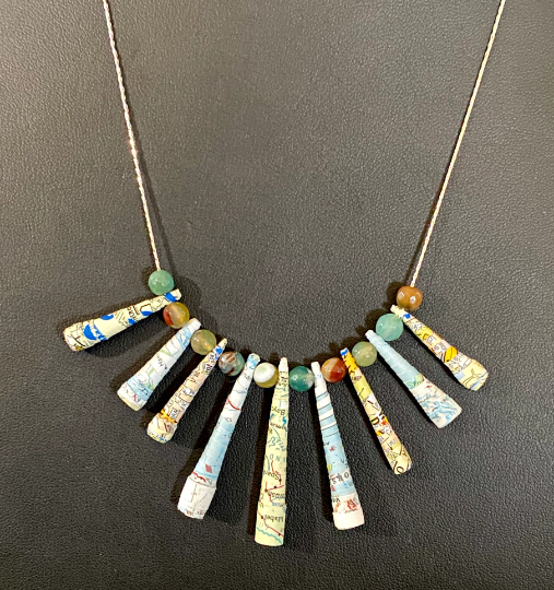Looking for a unique gift idea? Check out my new Natural Agate and Vintage Map Paper Necklace! Handcrafted with stunning multi-faceted Agate beads and intricate quilled map paper. A must-have for any occasion! #NaturalAgate  #HandmadeJewelry  #thisoldchair #etsyshop #etsyseller