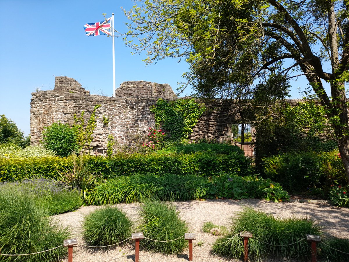 A quiet moment in the Garden of Remembrance, Monmouth Castle, Monmouth, South East Wales. The garden was re-instated in 2009 to commemorate the 100th Anniversary of the Territorial Army and was seen as a fitting memorial to all reservists who had served their country.
