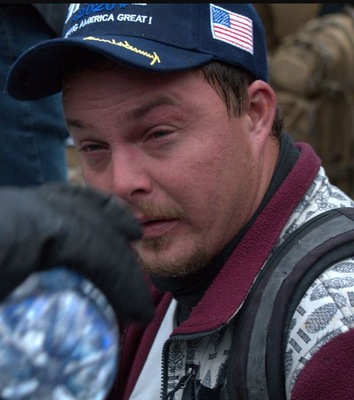 retiredtrnman's tweet photo. The #FBI has identified many people who incited violence at the U.S. Capitol on January 6, but it still needs your help to bring others to justice. If the person in this photo looks familiar, submit a tip at https://t.co/LRUnRA40bG or 1-800-CALL-FBI, and mention photo #231-AFO. https://t.co/0gMjT8nmLb