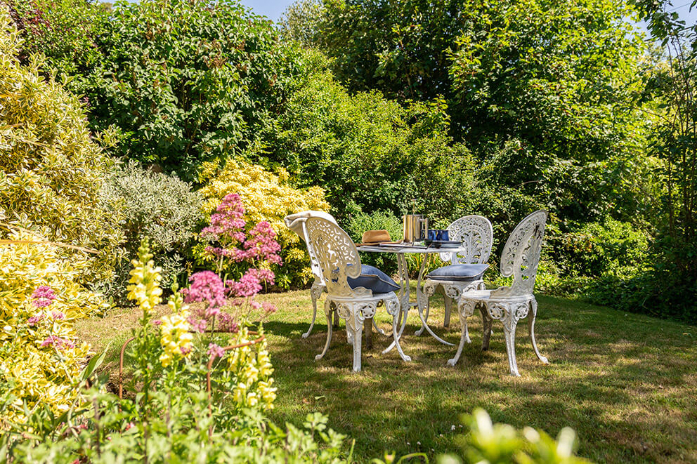 The Granary has a private enclosed garden with patio furniture, a barbecue and a tranquil pond to relax by on long summer evenings #holiday #shortbreak #shortstay #accommodation #selfcatering #dogfriendly #Suffolk