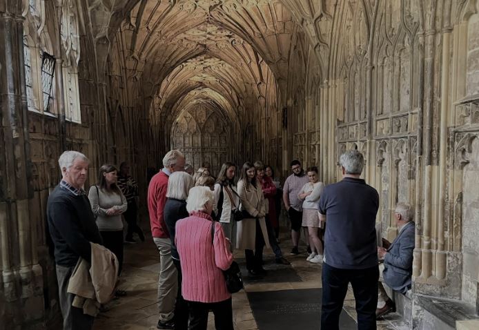 ancient_schools's tweet photo. Excellent evening spent recently in the atmospheric cloisters of @GlosCathedral enlightening groups of alumni and others @KingsSchoolGlos about medieval education.  Here one group is looking at the fascinating board games scratched onto the benches by some of our first scholars. https://t.co/1rFQYVaJxl