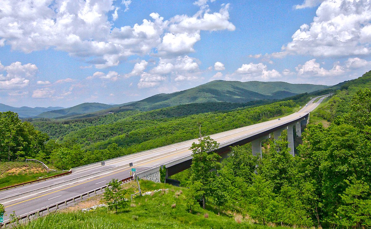 This is Corridor H– a 'road to nowhere' that cuts through pristine West Virginia terrain, and had been in construction since the 1970s. Nobody uses the highway, but the government has invested almost $20mil per mile. 1/3