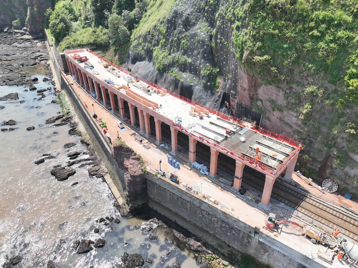 📷 We’ve reached a milestone in the construction of the 109m-long rockfall shelter to help protect the railway north of Parson’s Tunnel, near Holcombe. 🏗 All 185 pre-cast concrete units are now in place, with our final concrete pour on the roof deck due to take place next week.