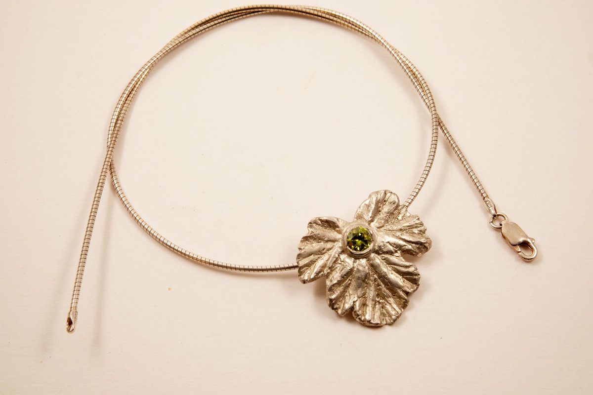 Silver Metal Clay Geranium Leaf Pendant with Ovaline cubic zirconia feature on 18 inch sterling silver chain.