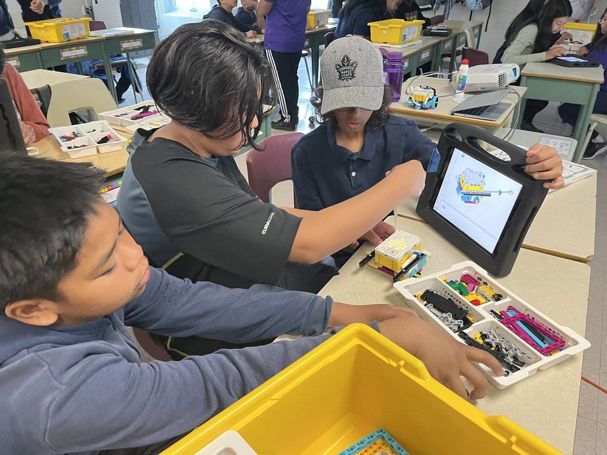 Teacher_Bertin's tweet photo. My Grade 6 students are loving building and coding robots today with First Canada! So much fun and engagement in Room 217! #coding #learningwithrobots https://t.co/jHO8CcATC9