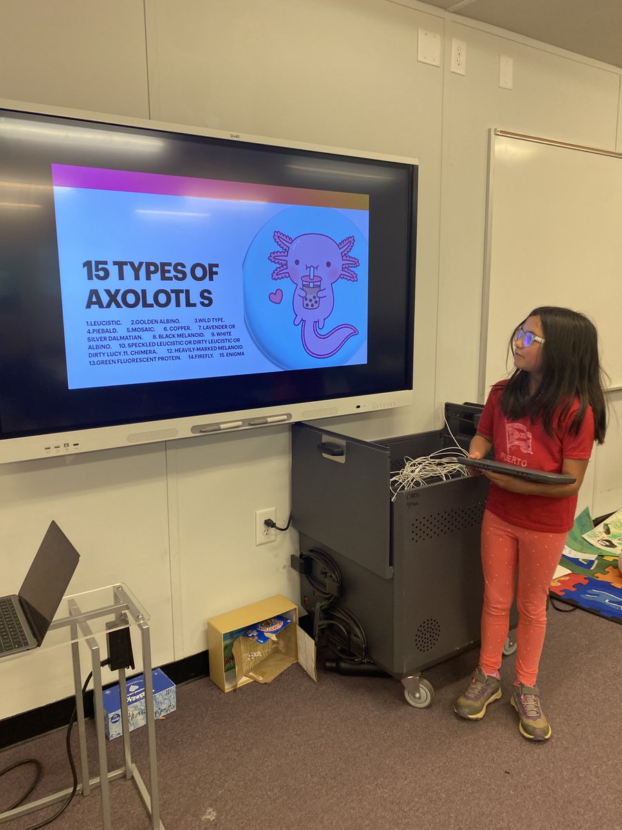 Third graders presenting their projects using new tech.  Congratulations!