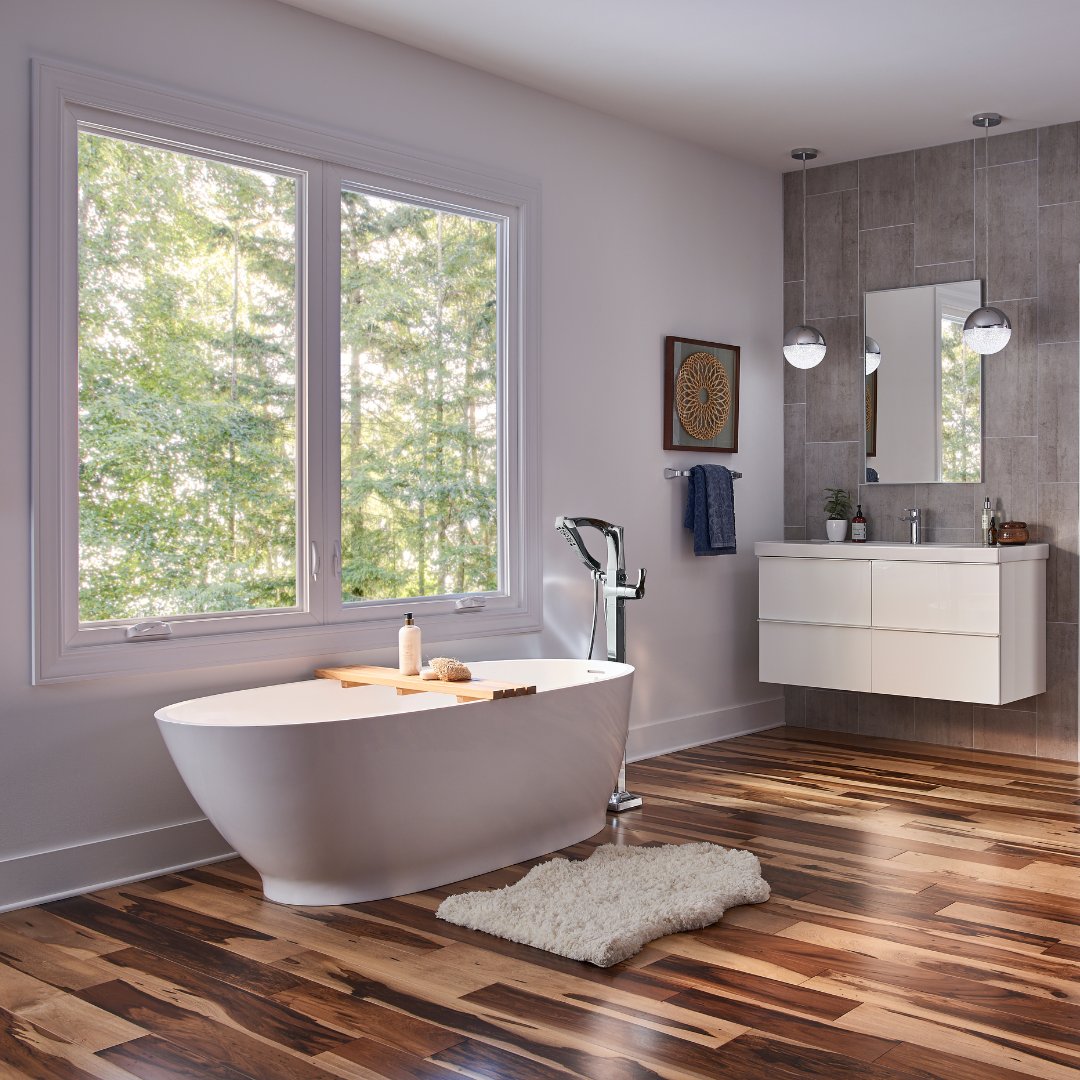 WindowWorld's tweet image. Taking a few moments to relax and breathe before starting the day. It's all about bringing peace to your mind—which is much easier to do with this view! #remodelinspiration #remodel #windowworld #bathroomremodel