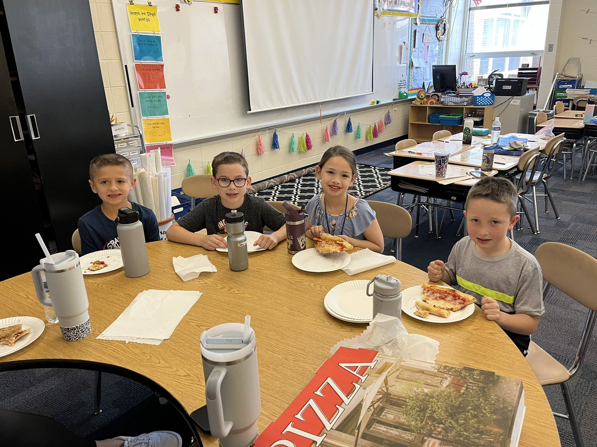 First grade teachers are having a blast eating lunch with our lucky teacher treat winners!! 🍕