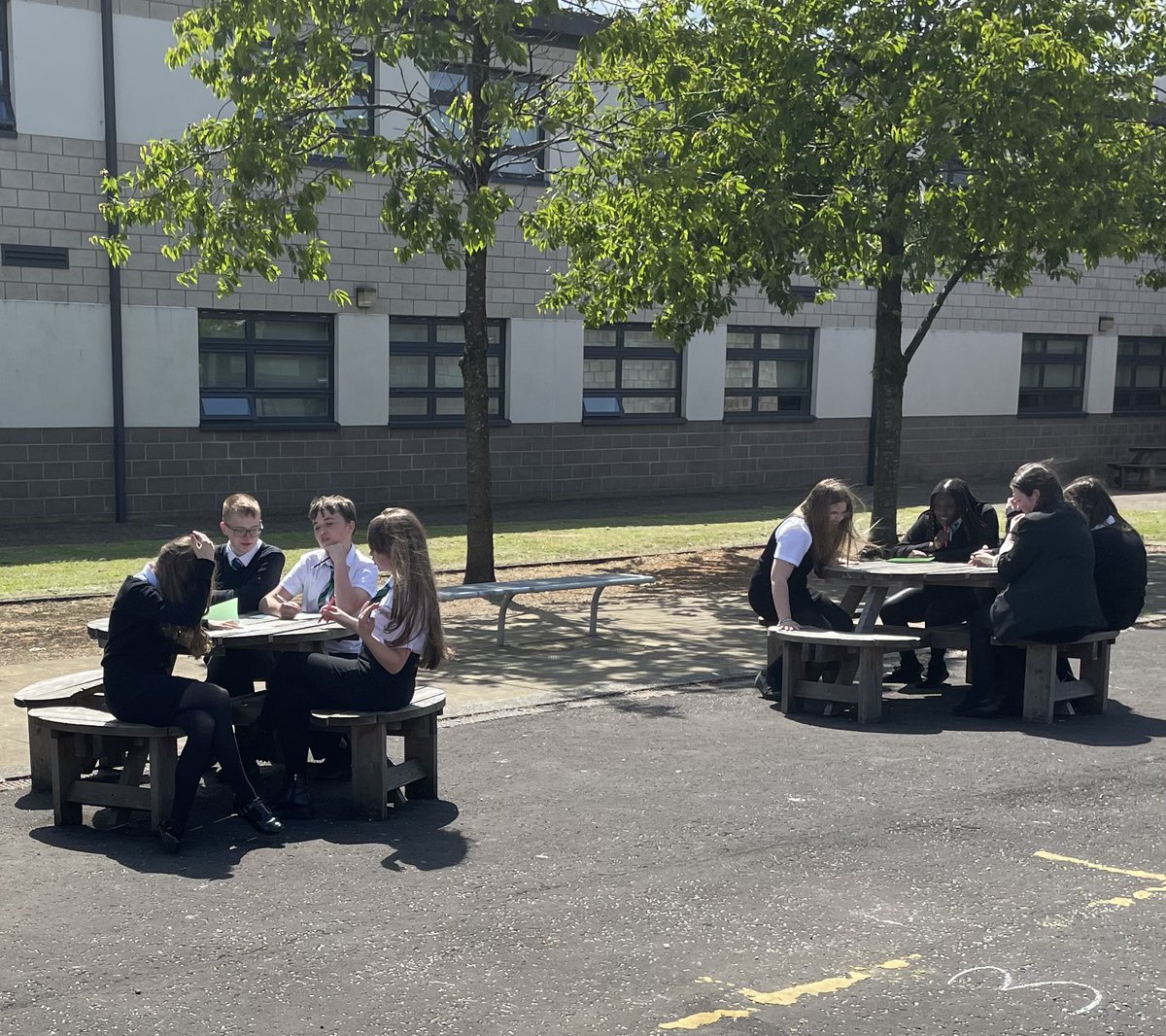 S2 Social Education enjoying some time in the sun, discussing their ideal school building. <a href="/stbenedictsren/">St Benedict's High School</a>