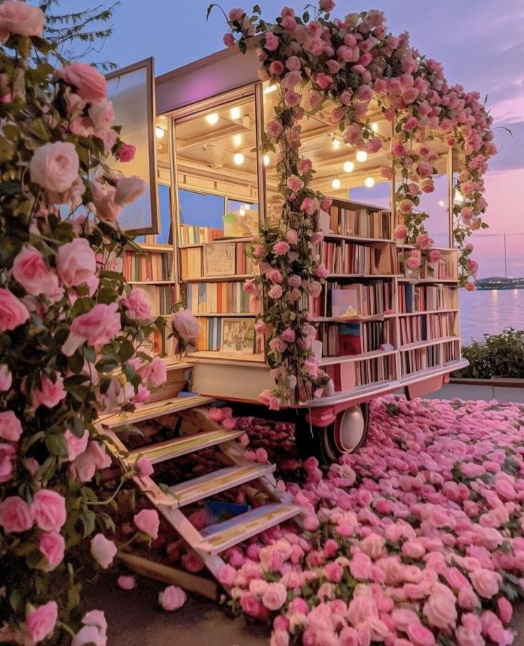 dolliefae's tweet photo. Books and flowers https://t.co/FUgACF584l