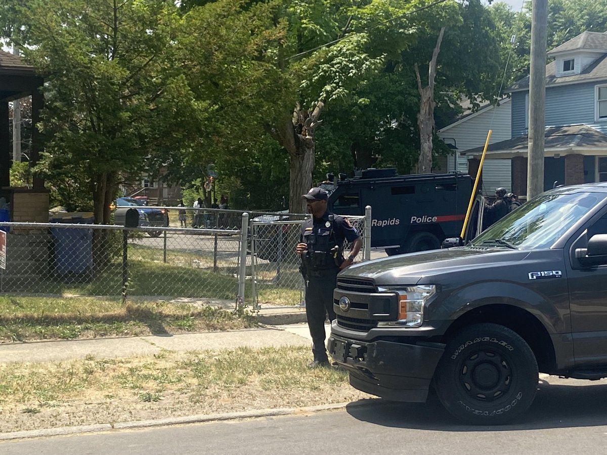 joelafurgey's tweet photo. GRPD confirms one adult is also in the house, but is not  considered a hostage. Police have been communicating w/the man, but so far he’s staying put. https://t.co/CaDItHr5dV