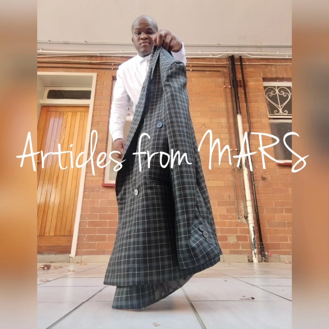 MARS_is_dope's tweet photo. The 2023 CHECK AND CHAIN SUIT minimalised to:

1. A white formal long sleeved white shirt with an irregular pentagonal back yoke;
2. Dark green, check print suiting close fit leg &amp; multiple waistband pair of pants; and
3. A dark green check print suiting classical jacket. https://t.co/T81cCa5R4R