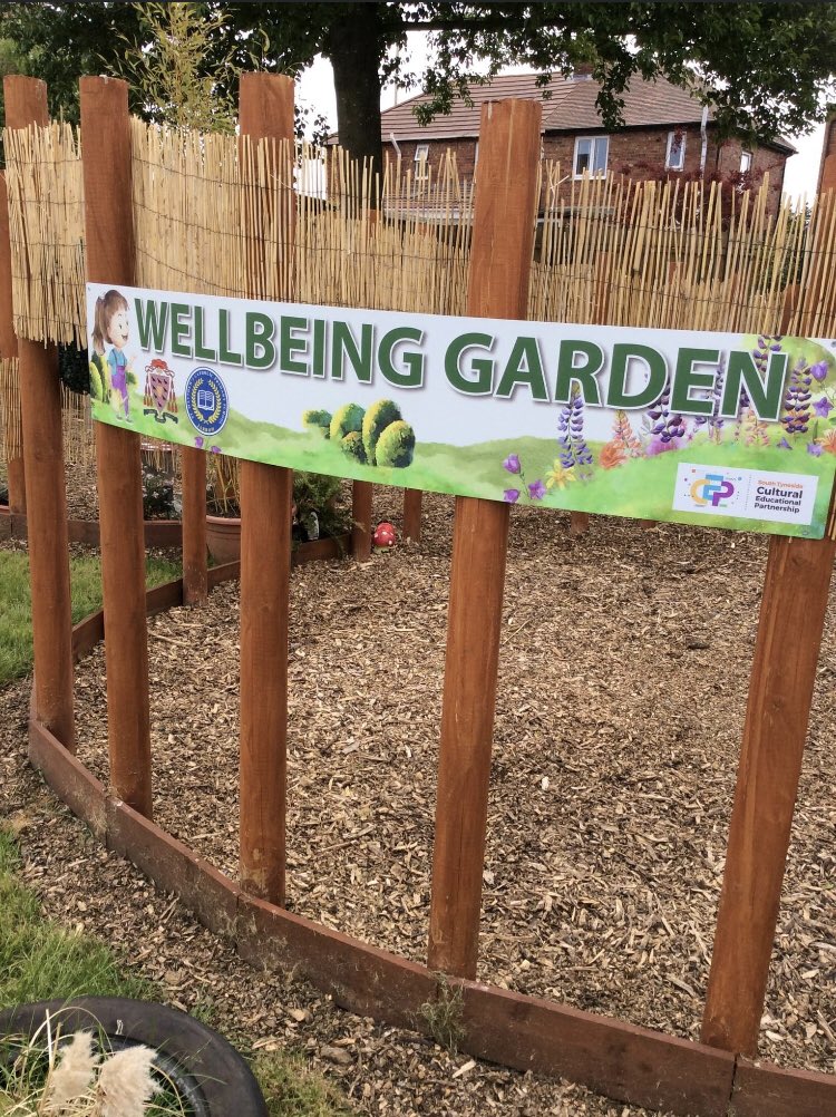 stmatthewsrc's tweet photo. It was lovely to welcome Mr Tapping, @bccet @DrPhilCummins and other guests to St Matthew’s today to officially open our new well-being garden. The children and staff can’t wait to use it. #Wellbeing #outdoors https://t.co/bQdqOs2b7f