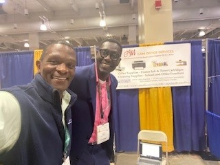 We were happy to be at this week's MASSBUYS Expo! Pictured is the SDO's Rob Williams with Keemo Ceesay, President of CAM Office Services.