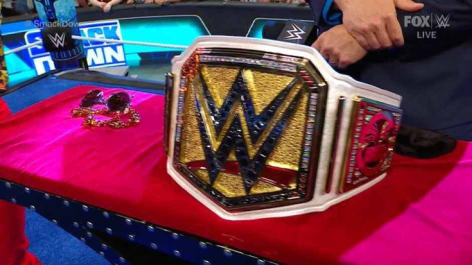 #SDLive That literally the WWE undisputed universal championship but white lol