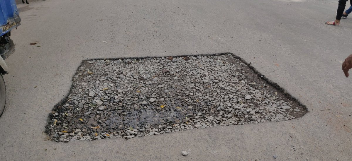 GoyalMalini's tweet photo. Pot-holes are turning into tank-holes in the neighbourhood in #koramangala

I am sure for a reason. #BBMP i hope has some good plans to fix them. 
@UnboxingBlr #Bangalore #Bengaluru #startup #tech https://t.co/S67MNu4rYt