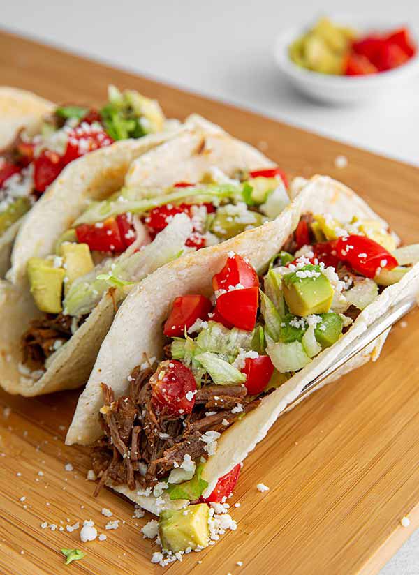 It will soon be Taco Tuesday and there is no better way to celebrate than enjoying these Shredded Beef Tacos. This recipe makes 8-10 tacos, so it’s just enough for your fiesta! Give this recipe from @glutenfreeandmoremag
#HatchNewMexico
#OnlyInNewMexico 
#NMTrue
#Whole30Certified