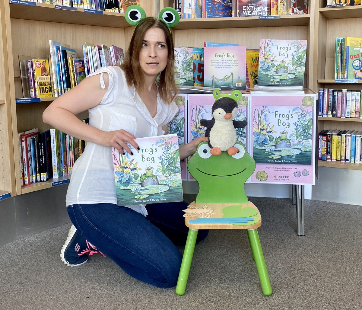 MarielleBayliss's tweet photo. Pebbles the Penguin at Addlestone Library is zeroing in on my act with a frog headband! They say imitation is the sincerest form of flattery, but I’m worried! 🐸🐸🐧🐧 Join us at 10.30am today. Tickets on the door (If Pebbles lets you in) #surreylibraries #addlestonelibrary https://t.co/2PAuFoE1kE