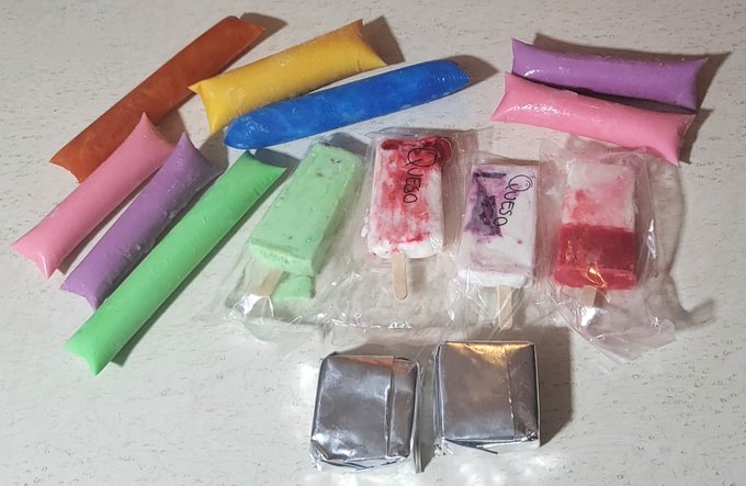Popsicles: Rompope (Latin American Eggnog), Strawberry Yogurt, Blueberry Yogurt, Mango with Chile, Bubblegum
