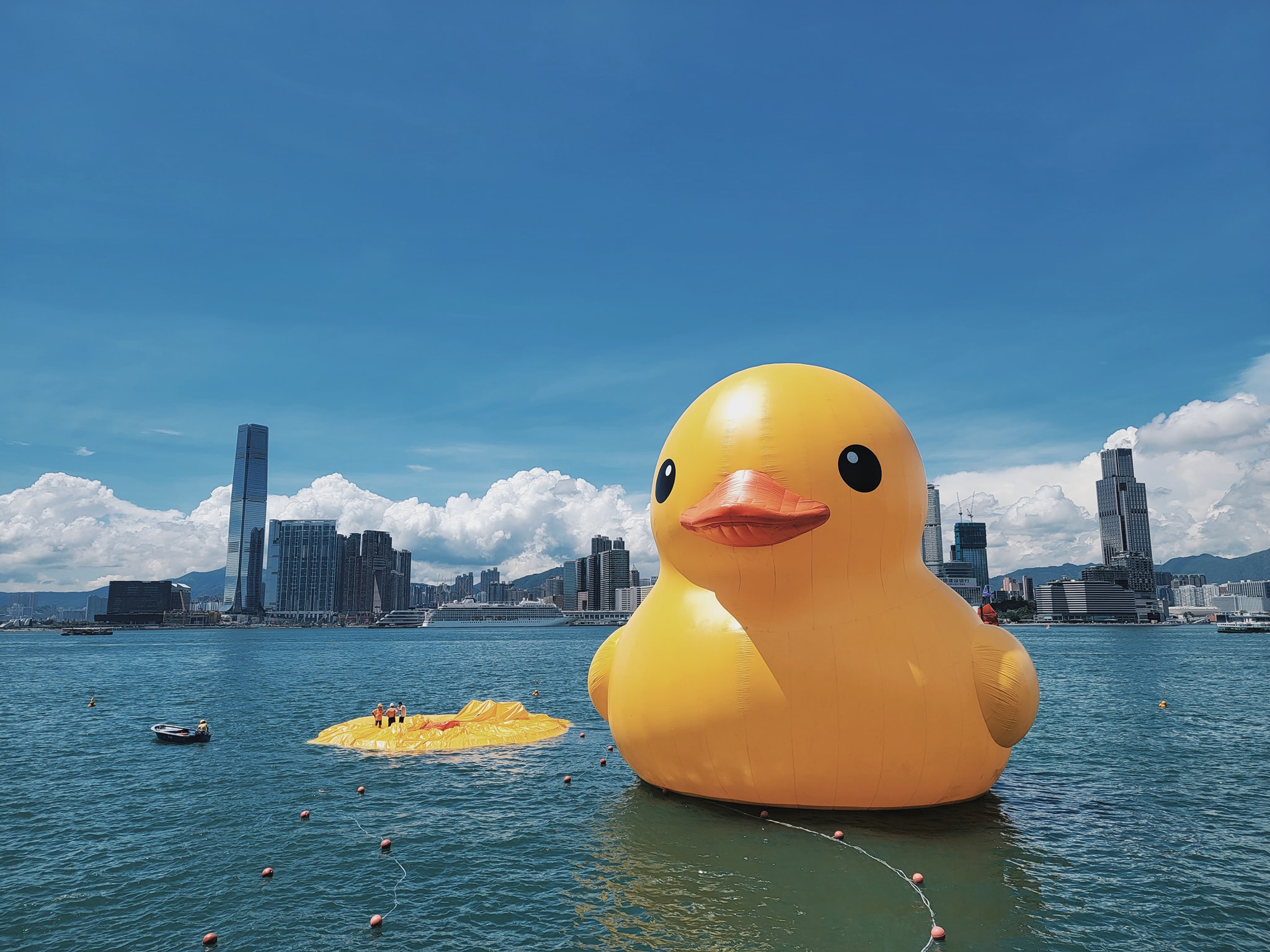 One of two giant rubber ducks in Hong Kong harbour deflates