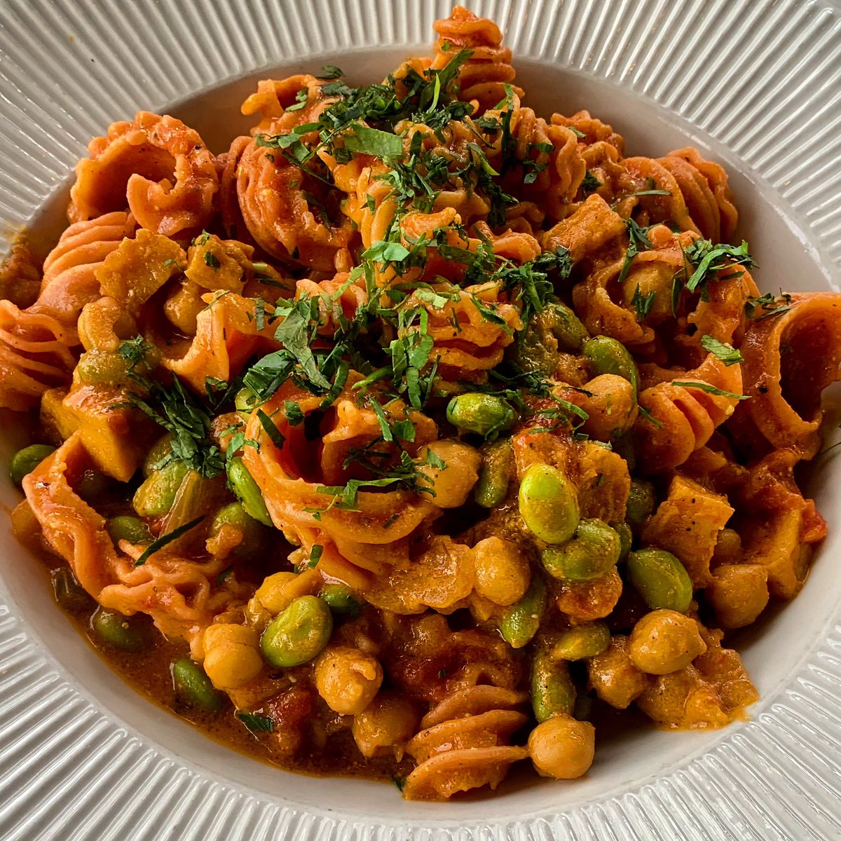 Curried tofu &amp; veggie pasta #thatnewnew 💥💥💥

edamame, chickpeas, kale, tomato ragu,
coconut milk, house made beet radiatore edition 🍝

#housemadepasta #currytofuveggies #veganoptionsavailable #itswhatsfordinner #glutenfreeoptionsavailable