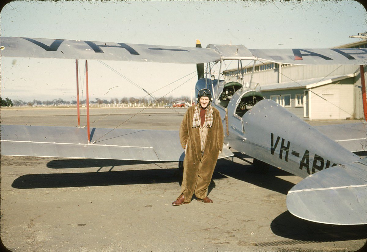 eric_riddler's tweet photo. #FoundSlideHoliday #FashionGoals Found slide: Pilot and Tiger Moth, possibly Cambridge Aerodrome, nipaluna Hobart, lutruwita Tasmania, July 1953 (photographer unknown) https://t.co/aCgvM4s2c0