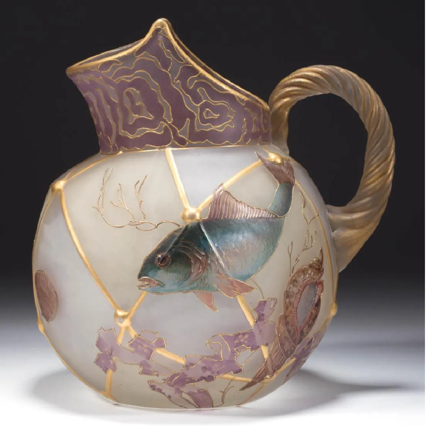 MT. WASHINGTON ROYAL FLEMISH FISH AND SHELLS ART GLASS NO. 506 WATER PITCHER

Mt. Washington Glass Co. Circa 1885. 8 1/8' HOA, 3 3/4' DOA rim.

Sold: $8,000

#AmericanMade #AmericanGlass