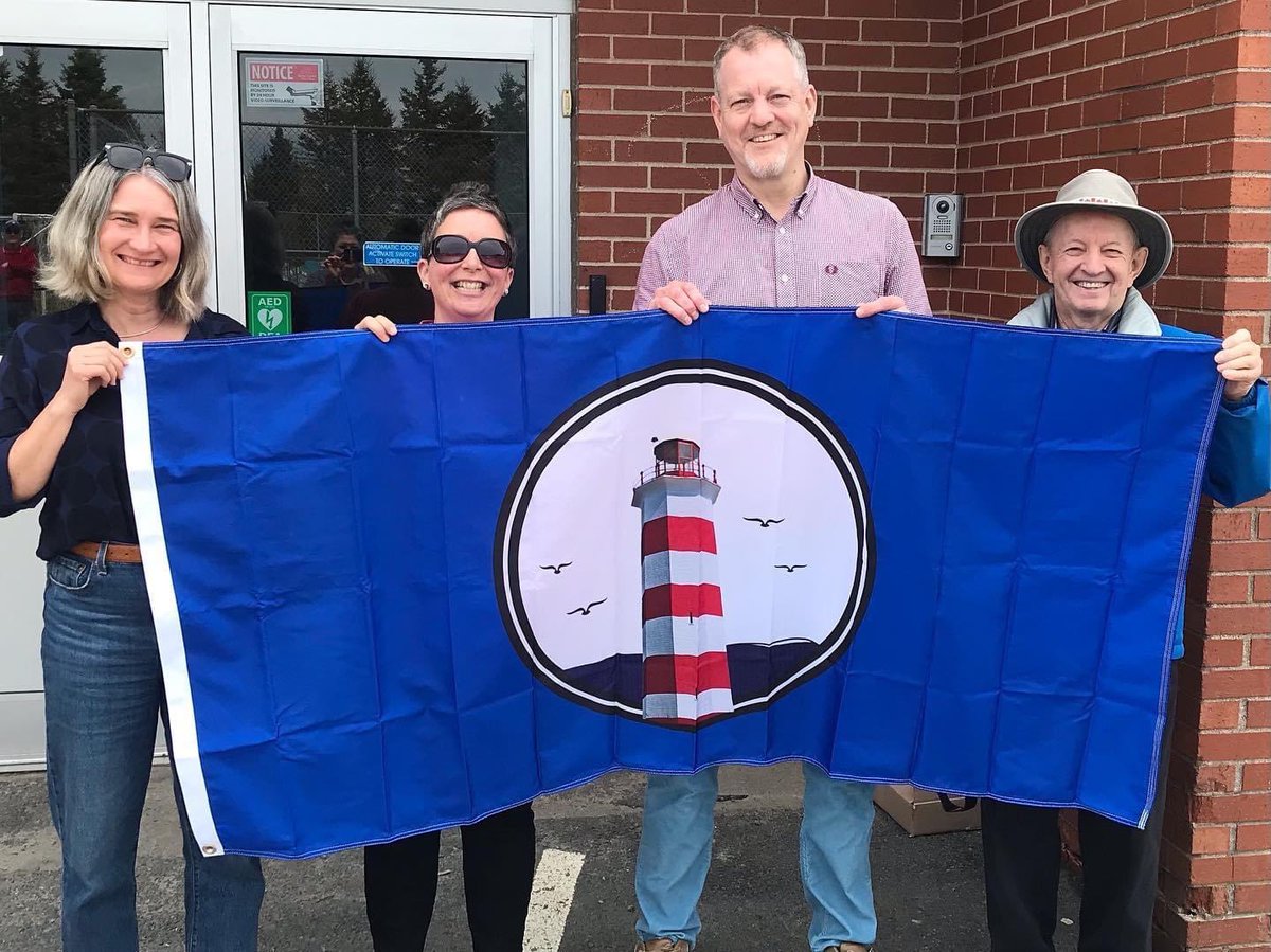 sambro_ses's tweet photo. Yesterday was a phenomenal day!  It was our official unveiling of the new Sambro Ketch Harbour community flag designed by two of our talented students.  Stay tuned for how you can order some swag! https://t.co/JhcpaxRcaD