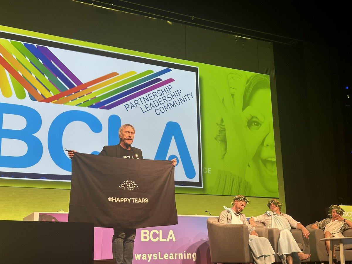 Here at <a href="/_BCLA/">ʙᴄʟᴀ</a> our own <a href="/btoptom/">Brian Tompkins</a> is pitching his idea for a #HappyTears towel to an assembled group of fancy-dress emperors. As you do! #bcla #bcla2023 #alwayslearning