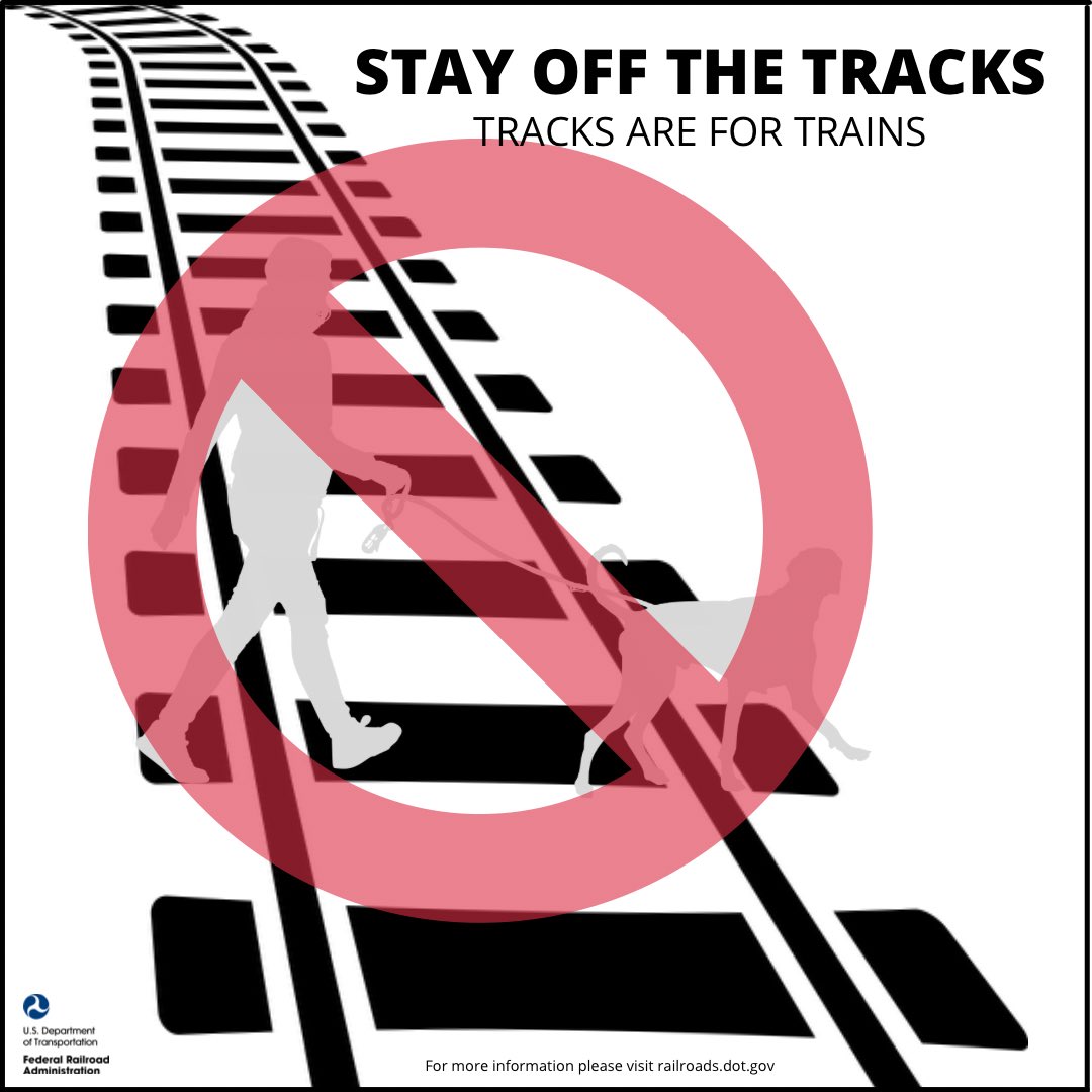 The train track is not a short cut. Only use designated crossings, a train can approach at any time.