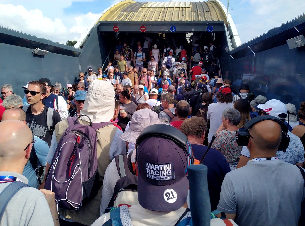 LeMansOldBlokes's tweet photo. Record crowds, yes  
Record crowding, also.
Moving between Forest Curves and Tetre Rouge compromised by bottleneck behind Grandstand.
Dunlop Bridge can't cope with volume of foot traffic.
Need more tunnels beneath track?
#HagertyRLM https://t.co/aJfxqSyIDh