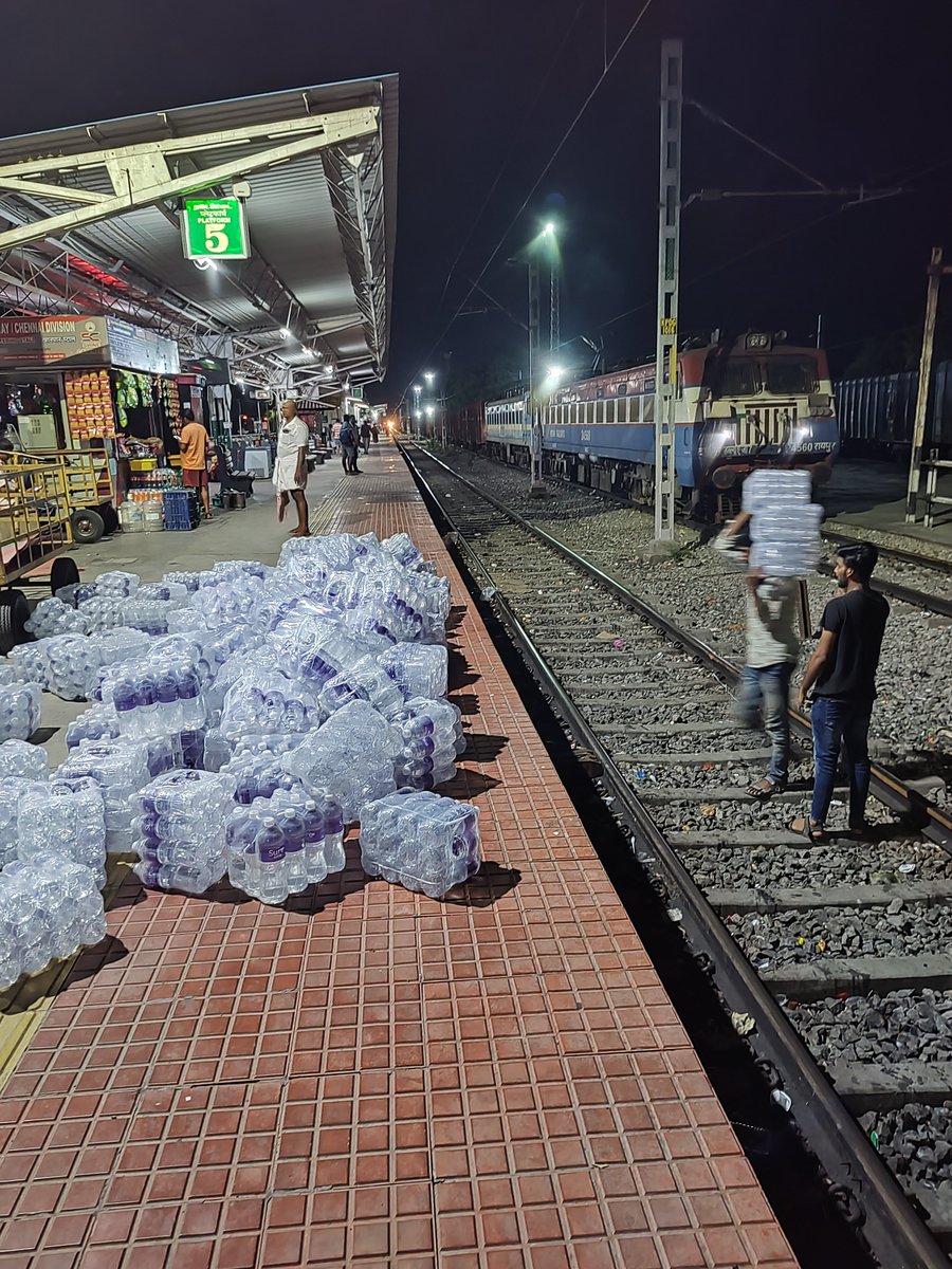 Ashutoshkumarvi's tweet photo. @RailwaySeva Vendors at PF 5 Katpadi railway station keep putting the water containers at the corner of platform. Creating inconvenience for the passengers. https://t.co/IZx0cx8ZmH
