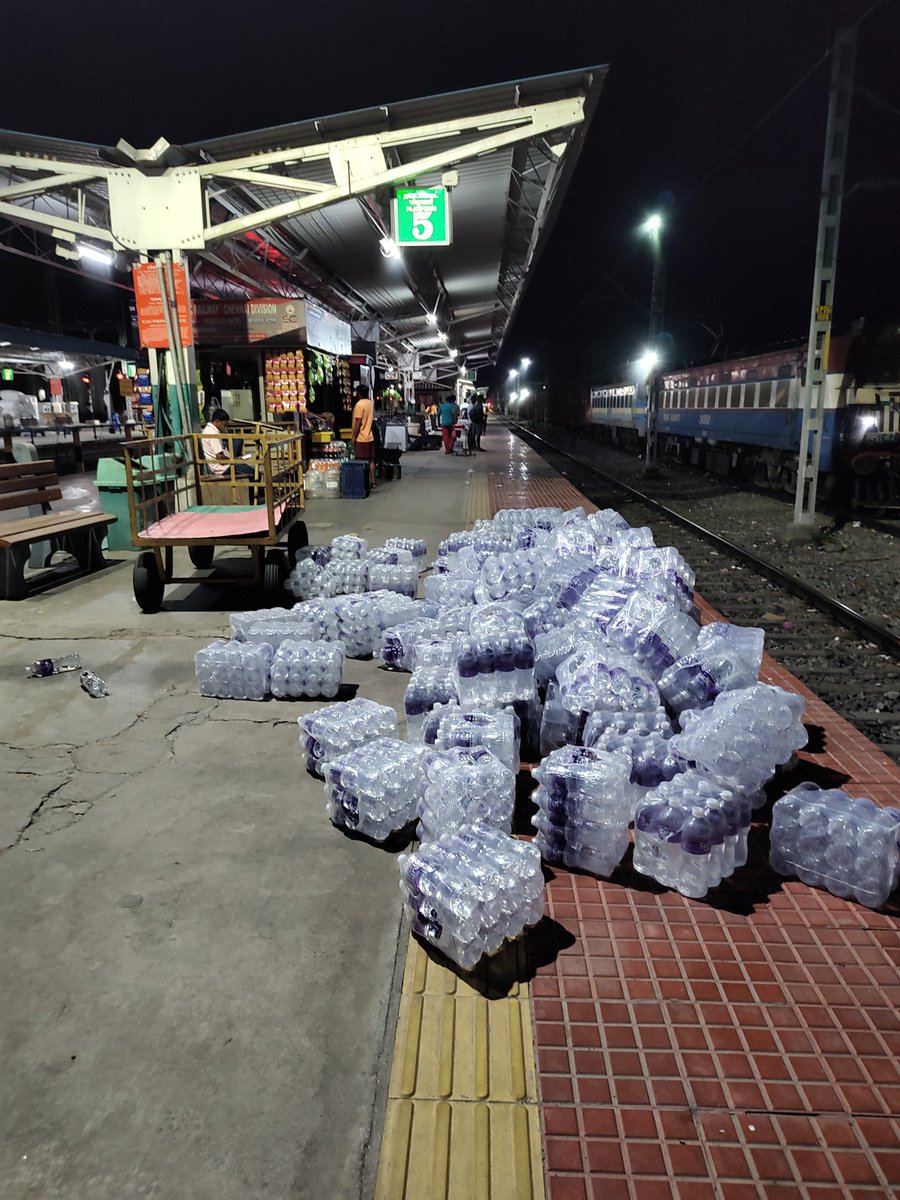 Ashutoshkumarvi's tweet photo. @RailwaySeva Vendors at PF 5 Katpadi railway station keep putting the water containers at the corner of platform. Creating inconvenience for the passengers. https://t.co/IZx0cx8ZmH