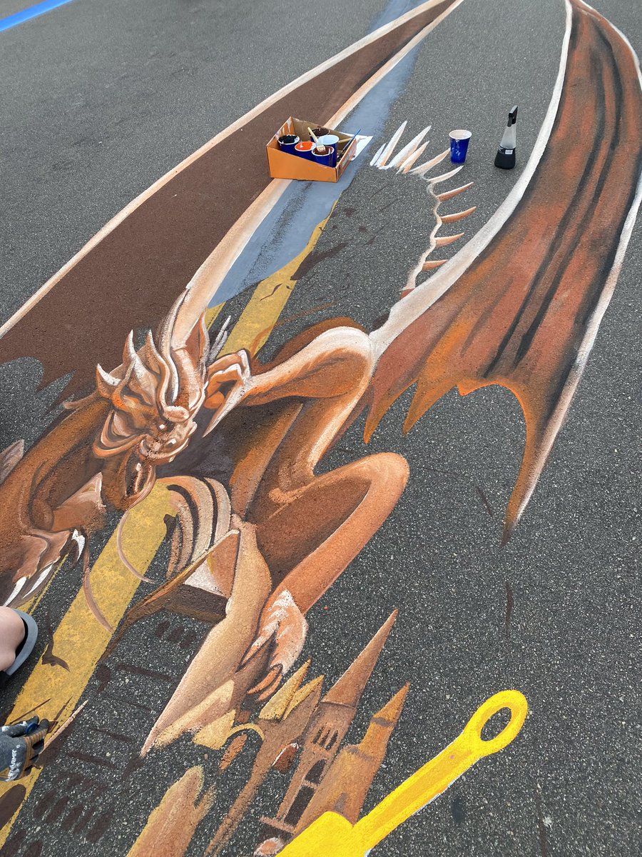 studiomccann's tweet photo. Allison and I are making progress on our 25ft long street painting here in Maple Grove, MN.  About 25 percent done.  Will be completed by tomorrow afternoon.   @ChalkfestMG https://t.co/6M63x09lpc