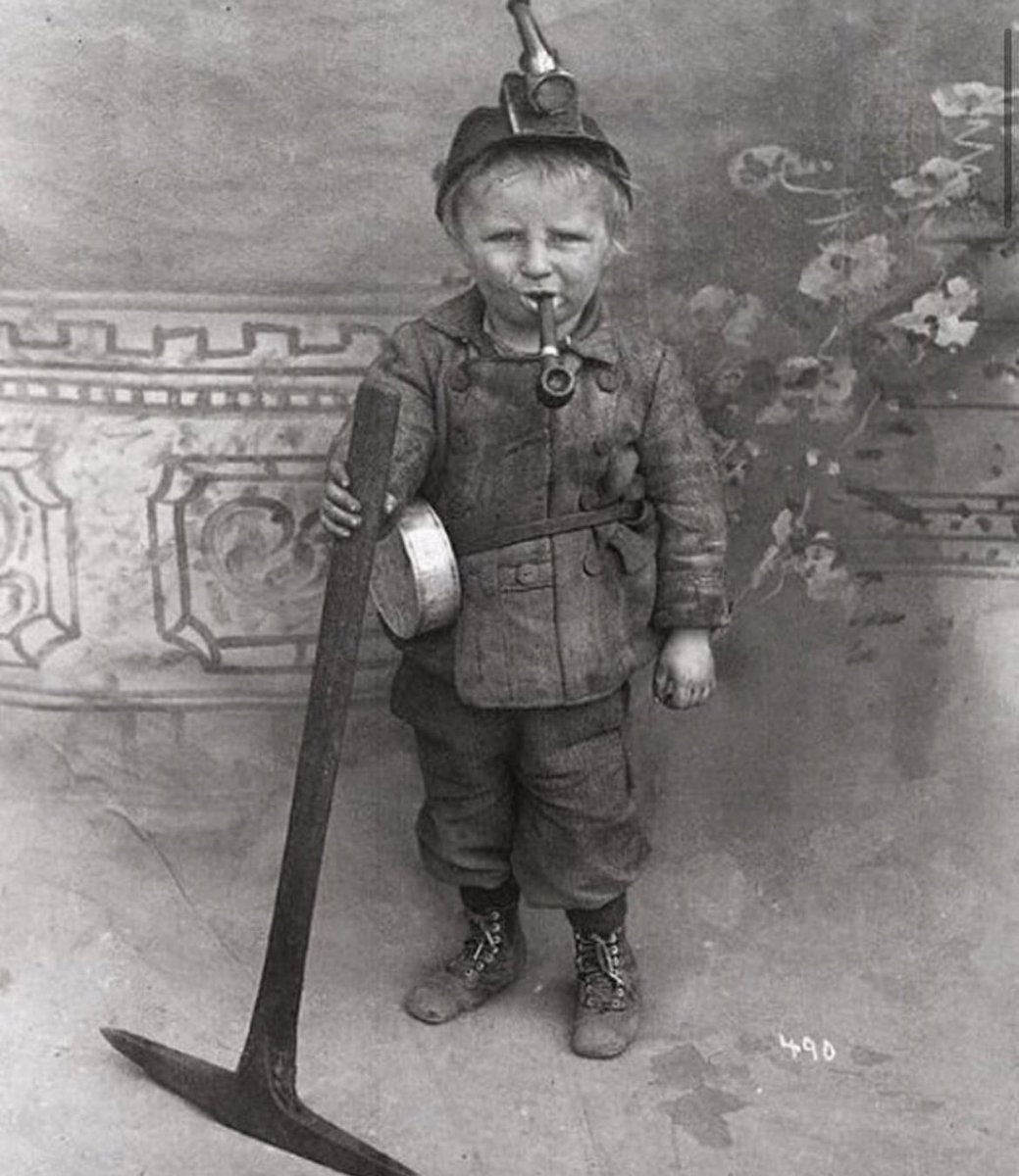 In the early 1900s, in Utah or Colorado, USA, a young miner boy toiled in the coal mines. Thousands of boys under the age of 14 were employed in these dangerous underground tunnels. The process involved drilling, blasting, and digging coal. However, this hazardous occupation