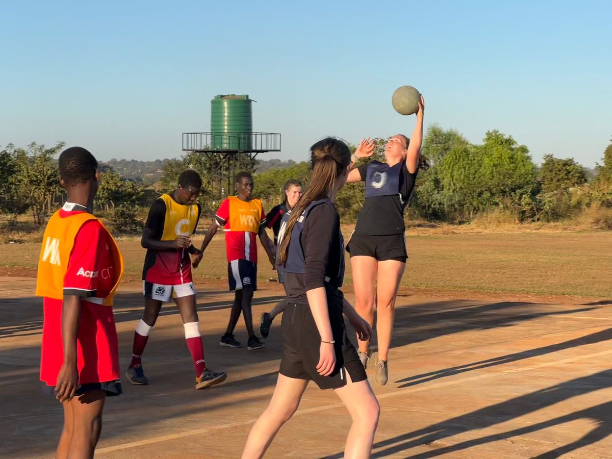 glasgow_nc's tweet photo. Flames 1 captain Grace is on the trip of a lifetime to Malawi. As part of the trip @gracesweeneyx arranged for the clubs old kit to be donated to the local community. Outstanding effort from Grace and the kit looks awesome on the kids 🔥🔥🔥 https://t.co/bXIY5L4WV3