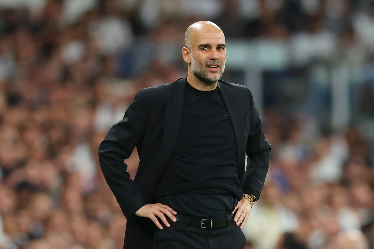 ShakinthatChalk's tweet photo. Pep Guardiola.

Tell me again why men can’t dress like this in schools? https://t.co/3VnEsgVmgW