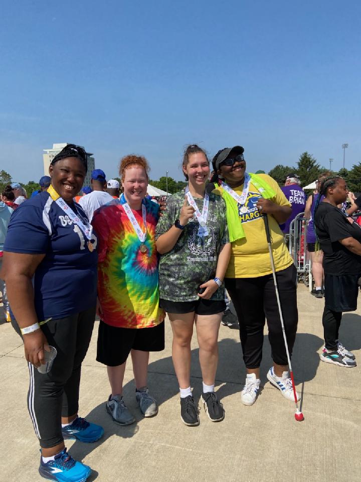 Elizabeth earned 4th in the shot put! Lots of camaraderie and sportsmanship in her division.