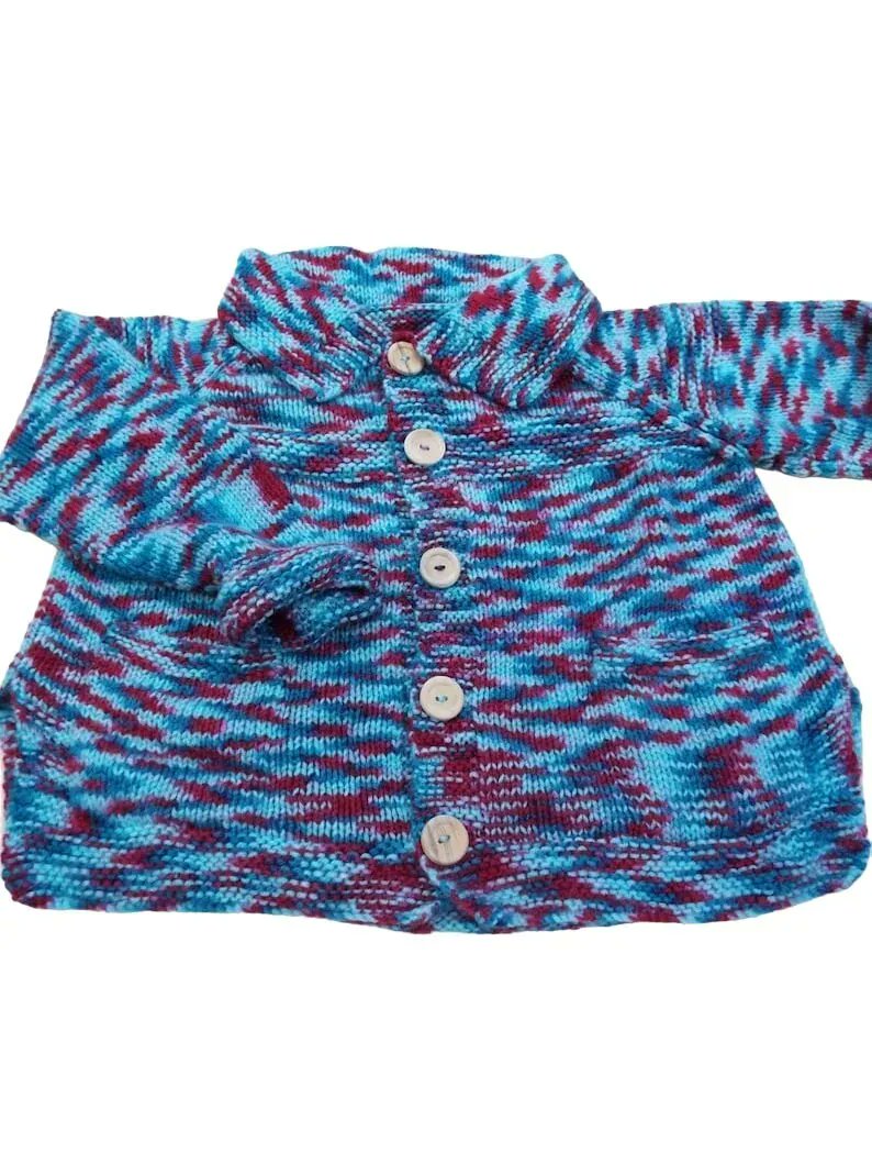 Hand knitted boys girls blue and red cardigan with pockets 6 - 8 years buff.ly/3IacLEi #knittingtopia #etsy #uksmallbiz #handmade #childrensknitwear #etsyRT #tweeturbiz #handknits #MHHSBD #craftbizparty